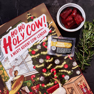Man Crates Jerky Advent Calendar 2024 Featuring "Ho-Ho-Holy Cow" Artwork – Includes 25 Delicious Bites of Beef Jerky – Delicious Flavors Like Orange Habanero, Rootbeer and More