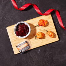 Load image into Gallery viewer, Man Crates Jerky Advent Calendar 2024 Featuring &quot;Ho-Ho-Holy Cow&quot; Artwork – Includes 25 Delicious Bites of Beef Jerky – Delicious Flavors Like Orange Habanero, Rootbeer and More